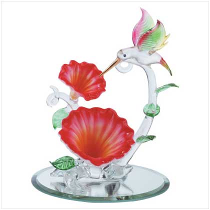 GLASS HUMMINGBIRD OVER FLOWERS