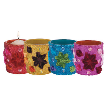 4 PC. FLOWERS VOTIVE HOLDERS