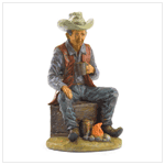 CAMPFIRE COWBOY FIGURINE